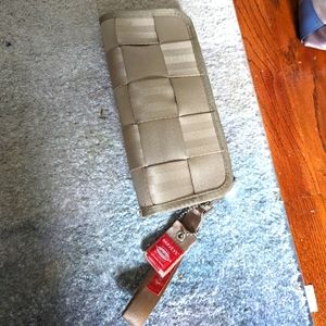 Harvey's seatbelt wallet in khaki. EUC